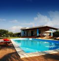 inground pool with pool house